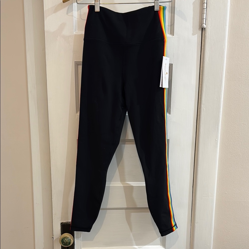 Women’s spiritual gangster Black Leggings with Rainbow Stripe on both sides.